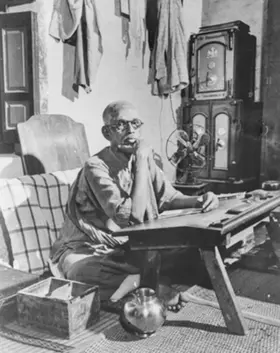 Niranjanananda Swami at his desk